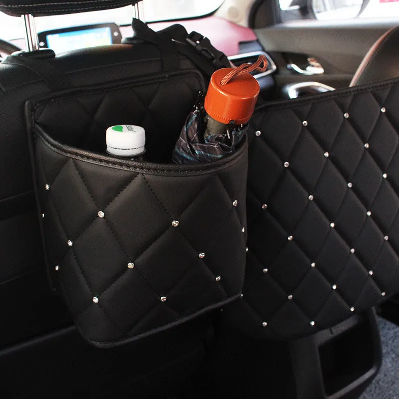 Nylon car seat storage net pocket 27x39x10cm in black, fitted between front seats