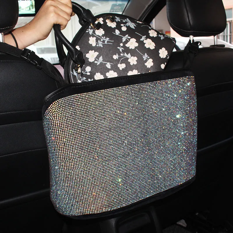 Nylon car seat storage net pocket 27x39x10cm in black, fitted between front seats