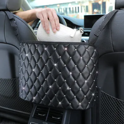 Nylon car seat storage net pocket 27x39x10cm in black, fitted between front seats