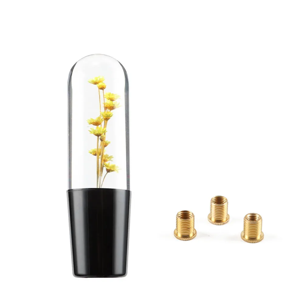 15cm tall transparent crystal car gear knob with internal flower decoration on a gear lever