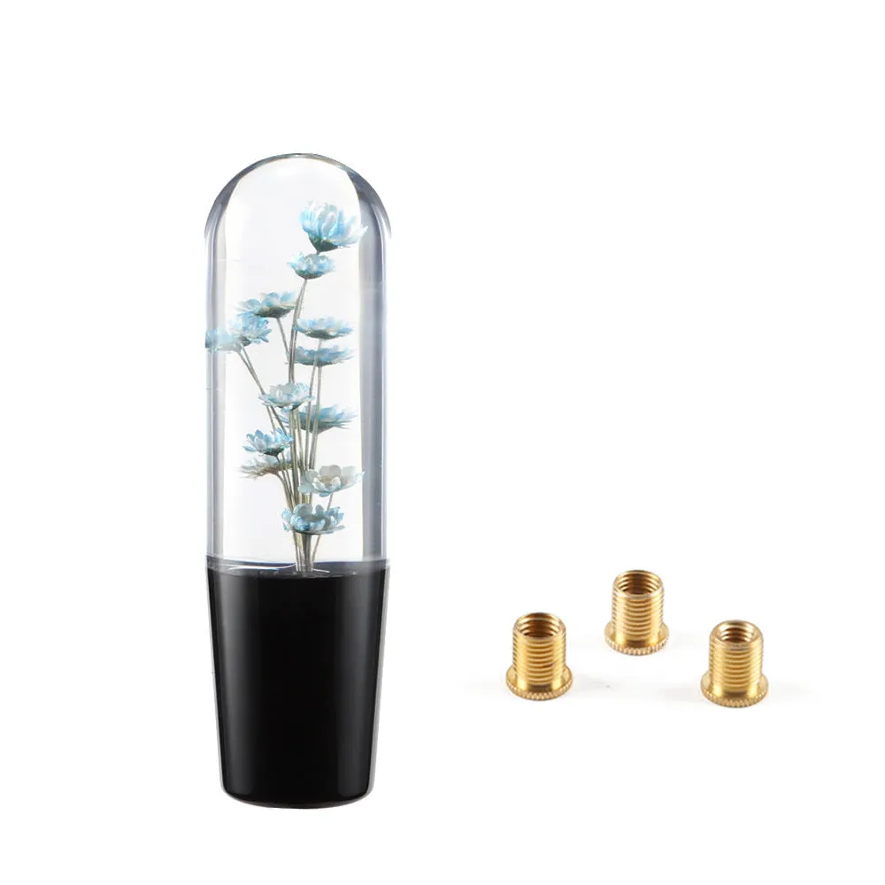 15cm tall transparent crystal car gear knob with internal flower decoration on a gear lever