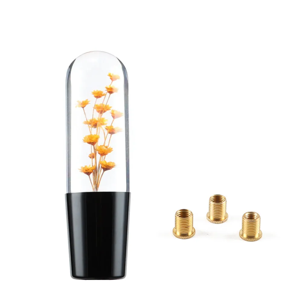 15cm tall transparent crystal car gear knob with internal flower decoration on a gear lever