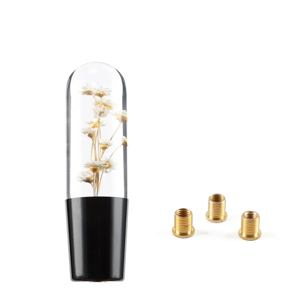 15cm tall transparent crystal car gear knob with internal flower decoration on a gear lever
