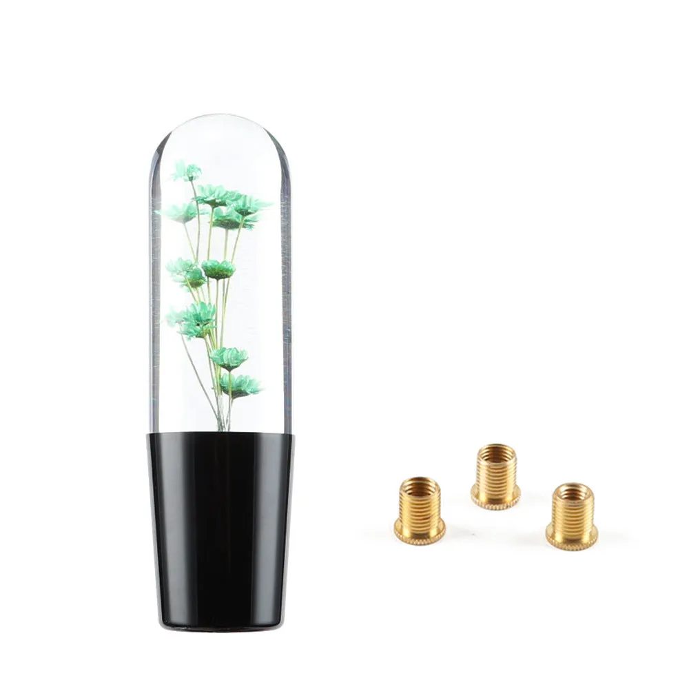 15cm tall transparent crystal car gear knob with internal flower decoration on a gear lever