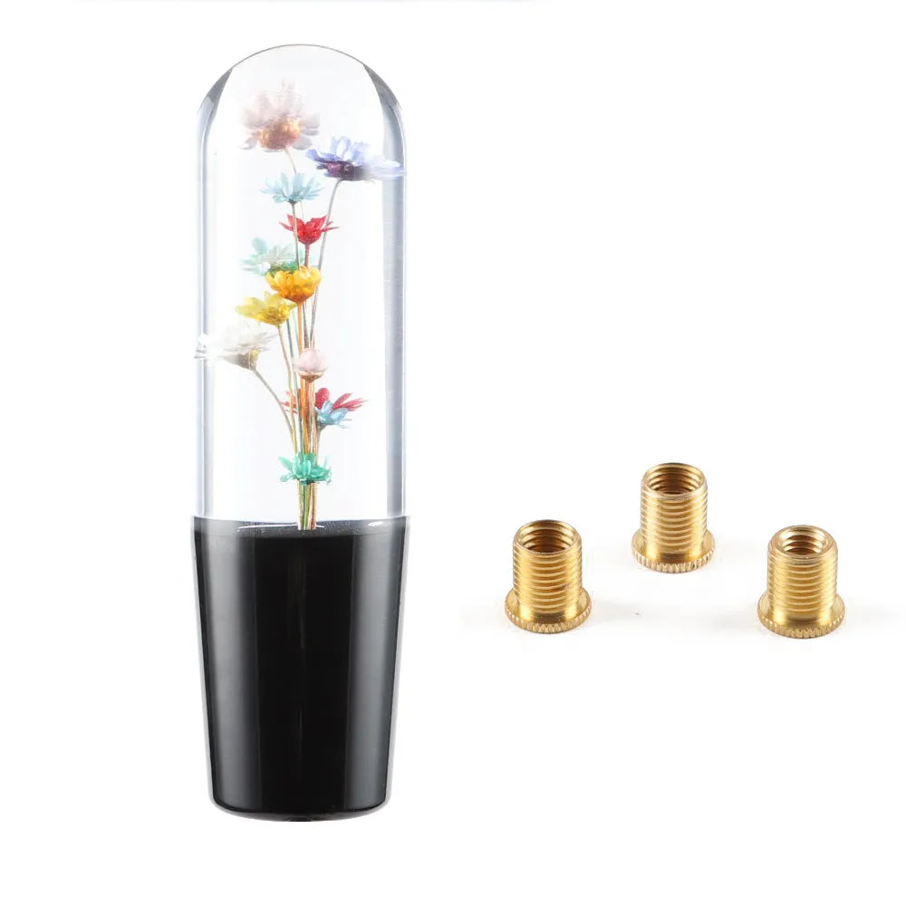 15cm tall transparent crystal car gear knob with internal flower decoration on a gear lever