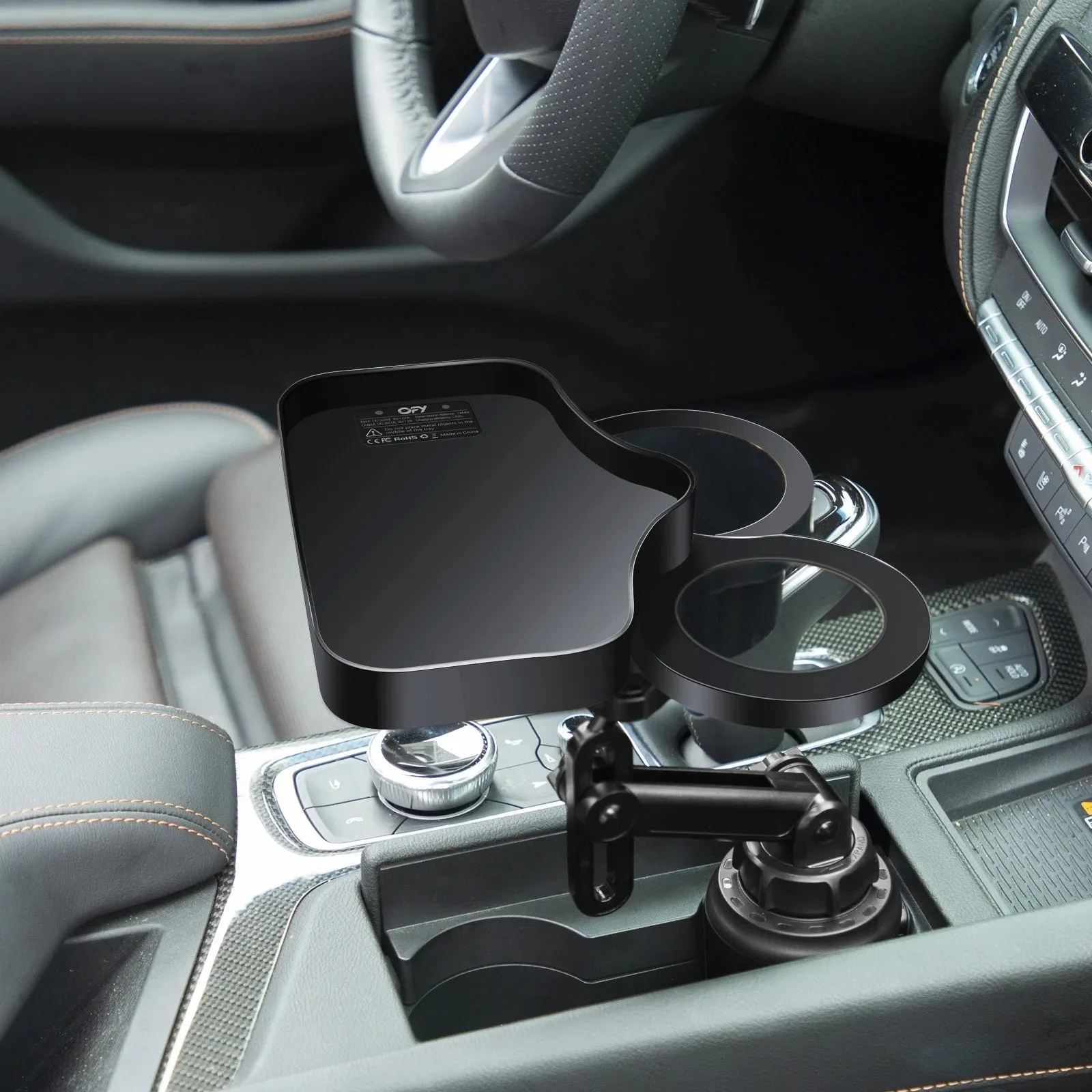 Car cup holder with wireless charging board, ABS and polyurethane construction, fits dashboard area