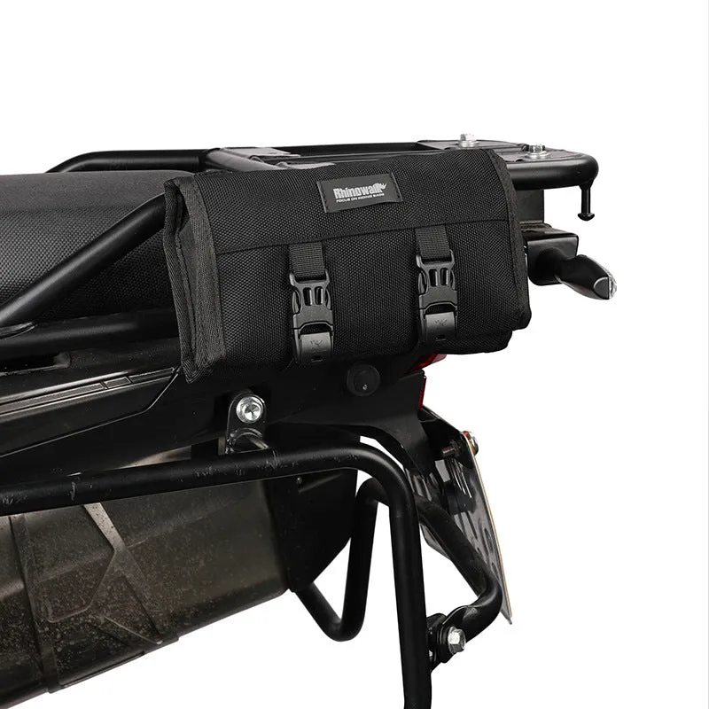 Motorcycle repair kit storage organiser in black, unfolded to show elastic straps and mesh zipper bag