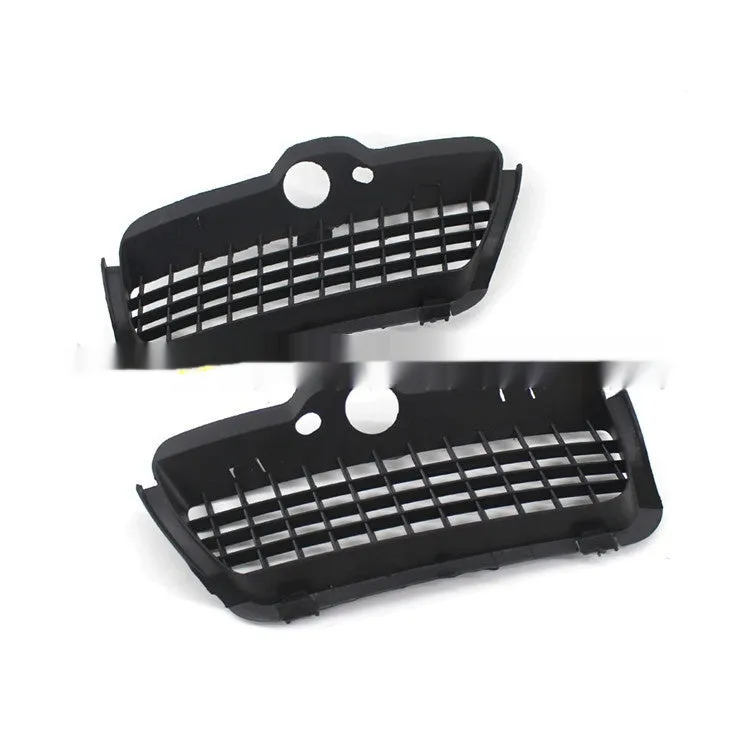 Pair of black ABS plastic Volkswagen Golf 3 front bumper fog light covers.