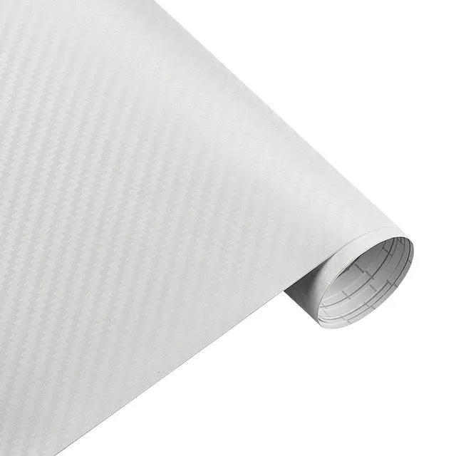 3D carbon fibre car sticker roll in black with textured pattern on a white background