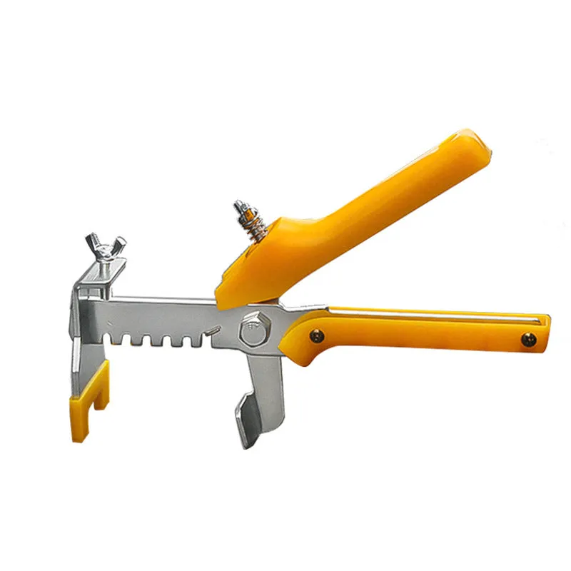 Orange plastic tile leveling wedges and white base clips on a tiled floor, with a rubber hammer nearby