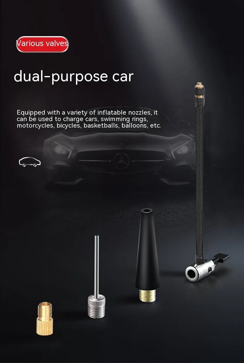 Red and black portable car tyre air pump with display, nozzles, and power cables on a table.