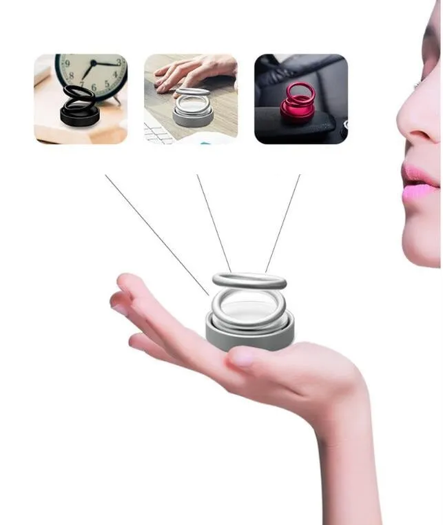 Double ring rotating car aromatherapy diffuser with aluminium alloy magnetic suspension holder in black