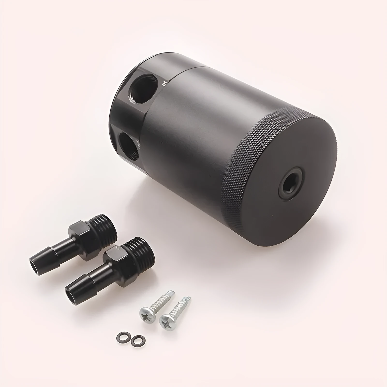Black and silver aluminium automotive oil pot with two ports and connectors