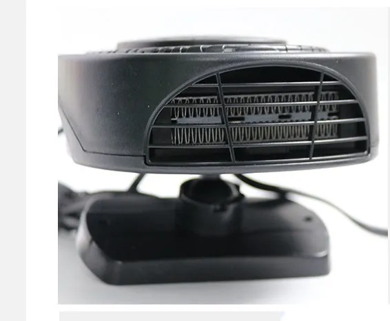 Black 12V car heating fan 7x16cm 150W with cigarette lighter plug on dashboard