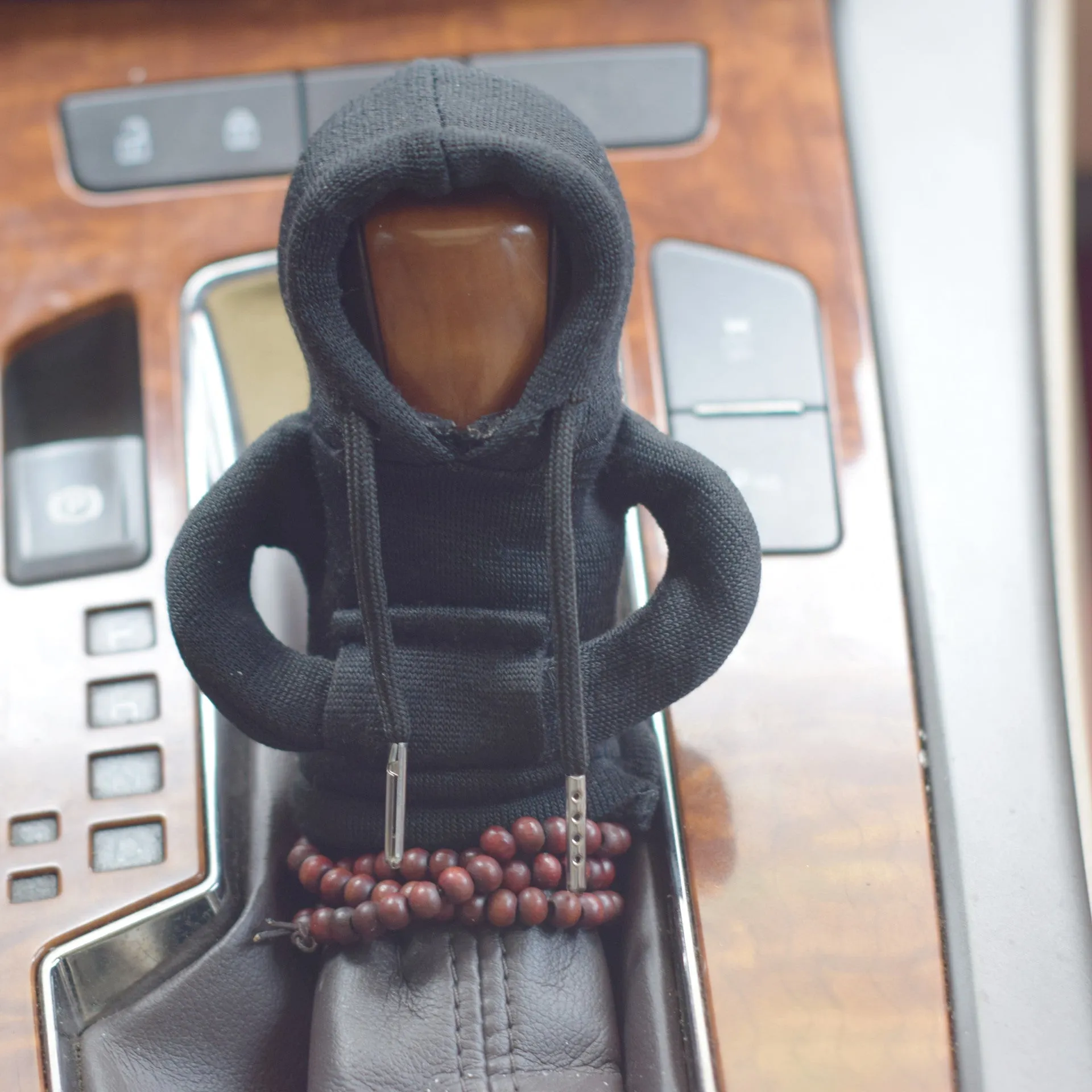 Dutch velvet car gear handle sleeve and handbrake cover in various colours on a car interior.