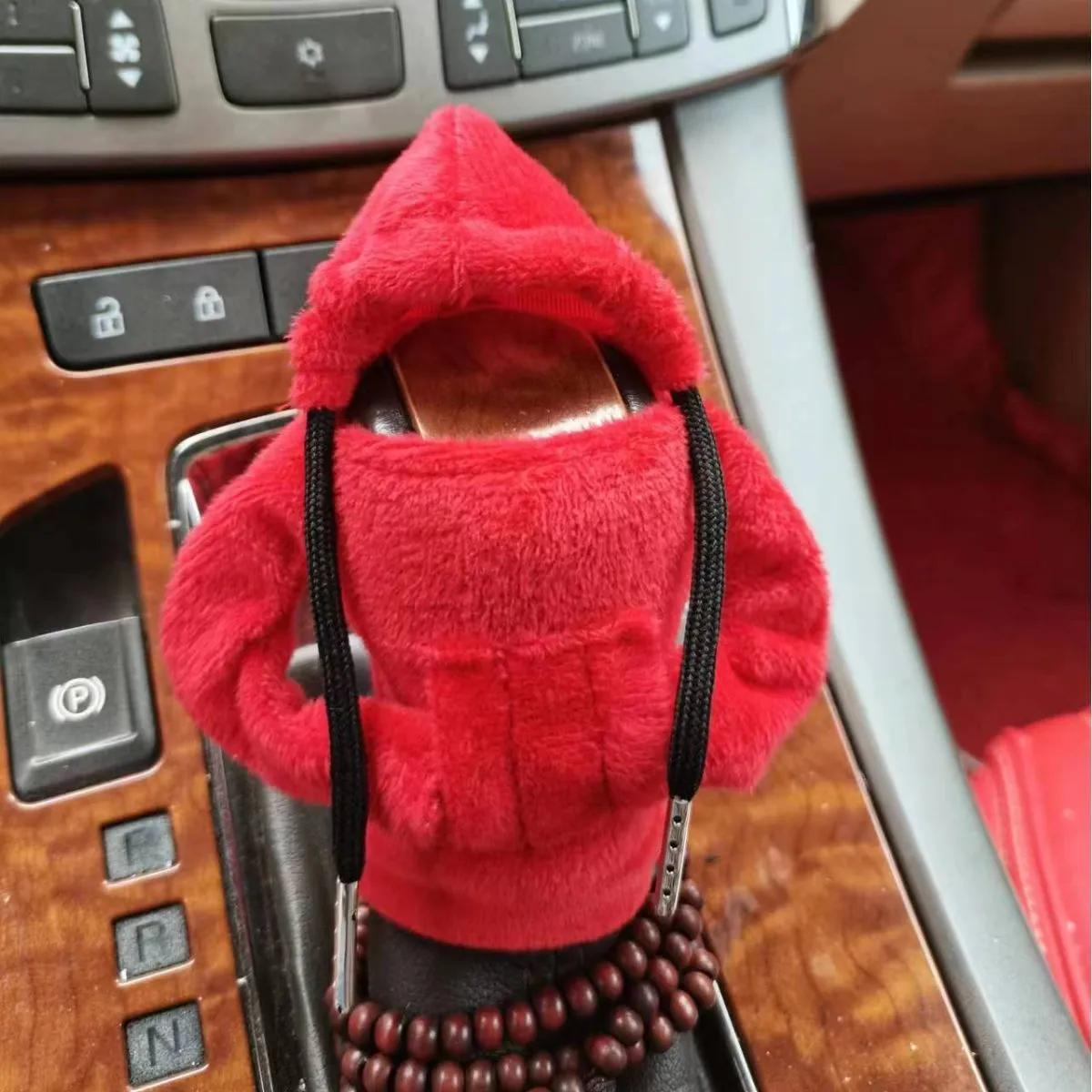 Dutch velvet car gear handle sleeve and handbrake cover in various colours on a car interior.