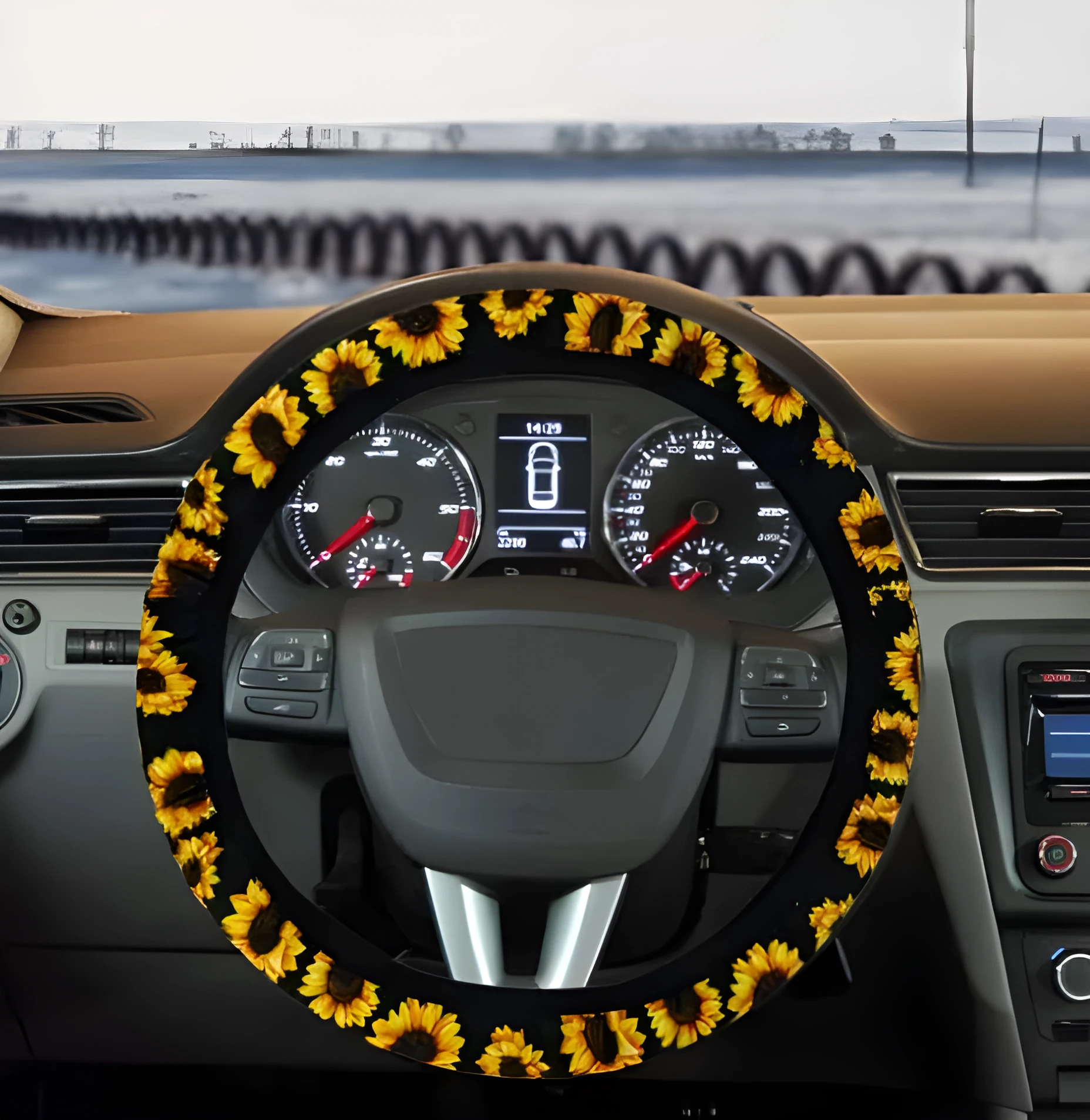 Sunflower steering wheel cover on car steering wheel with matching keychain and vent decoration