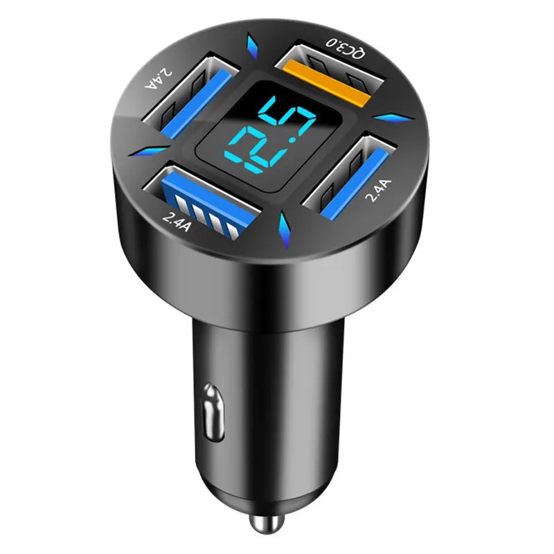 Black four-port car USB charger with LED digital display plugged into a vehicle socket.