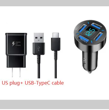 Black four-port car USB charger with LED digital display plugged into a vehicle socket.