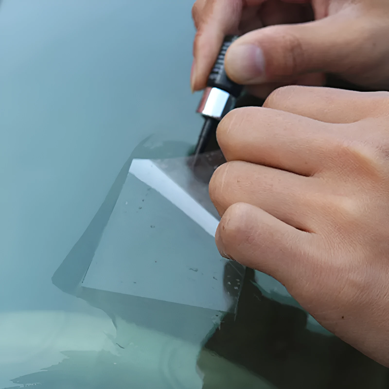 Yellow three-piece car windshield repair kit with glass repairing liquid