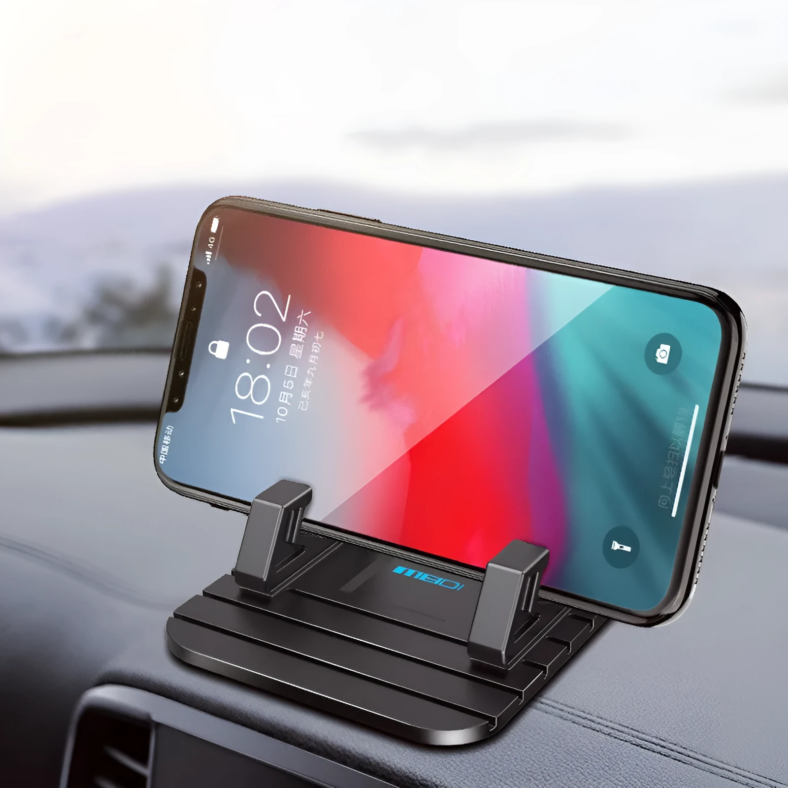 Car mobile phone bracket silicone anti-slip mat on centre console holding phone