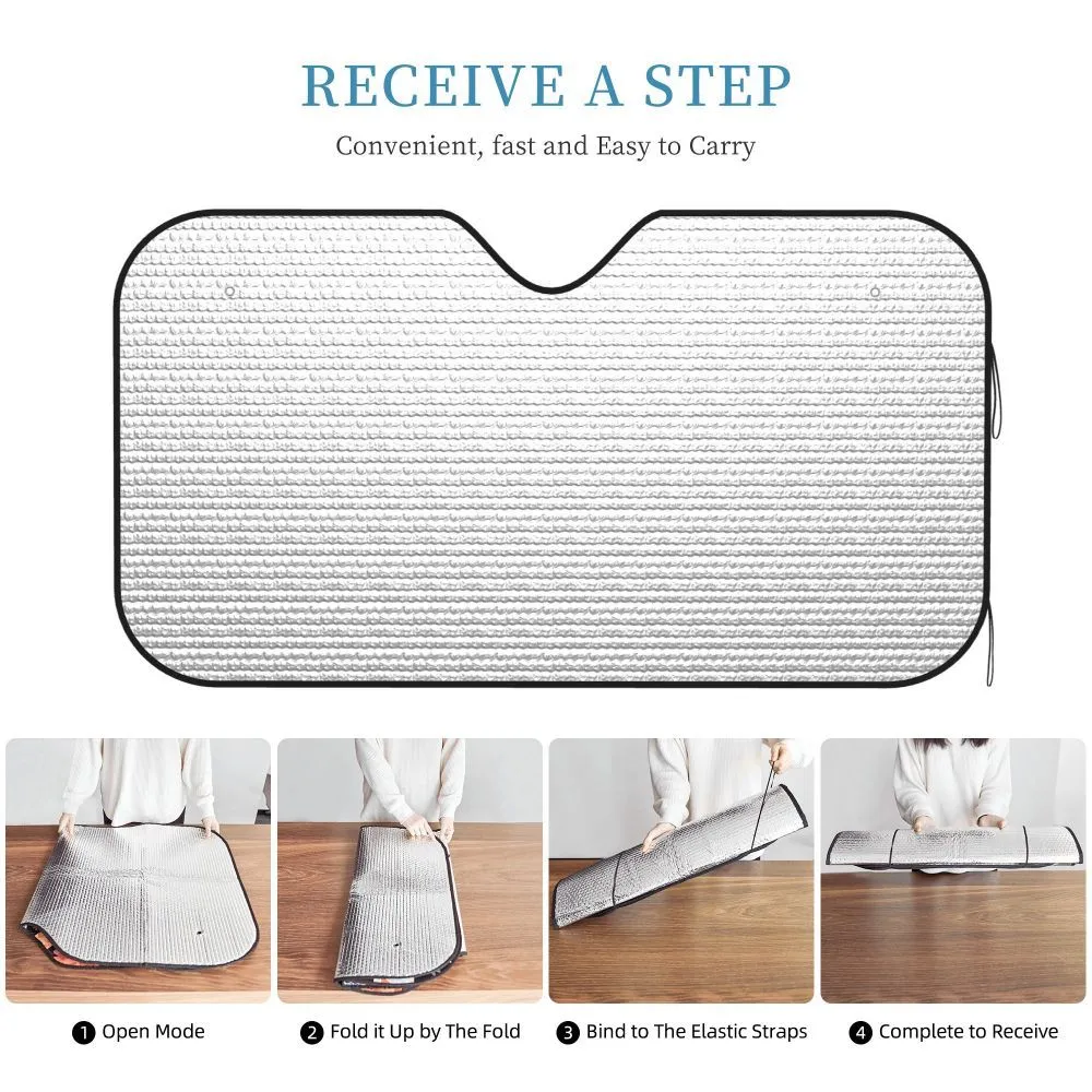 White aluminium foil bubble film car front windshield sun visor with two suction cups attached to glass