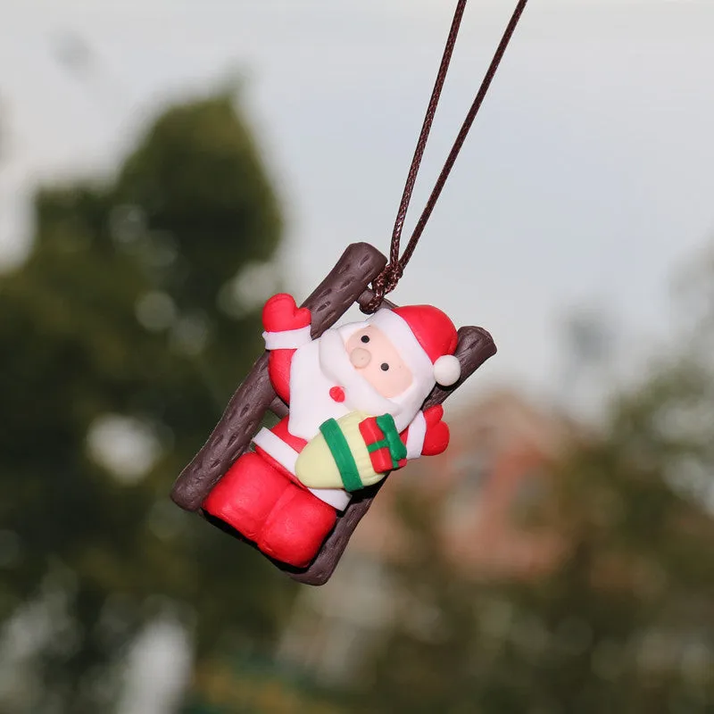 Resin Santa Claus cartoon pendant for car rearview mirror, 4.5 by 3 by 5 centimetres, 20 grams, four styles