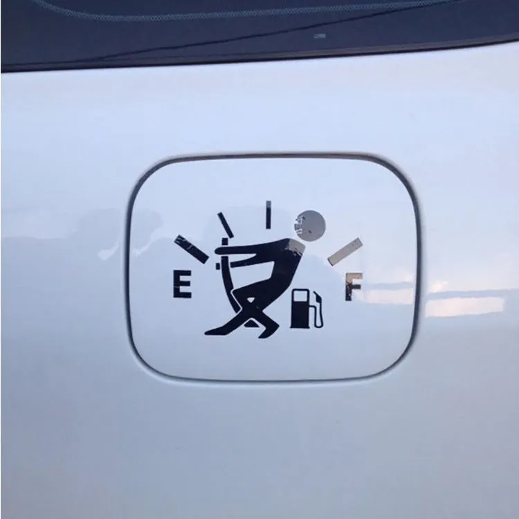 Reflective insufficient fuel car sticker 12.7cm x 9cm in black on a car dashboard
