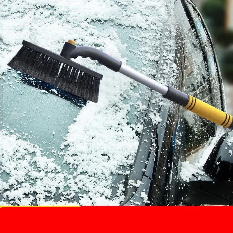 Yellow vehicle mounted telescopic snow removal shovel with brush and ice scraper extended to 80cm on car windscreen