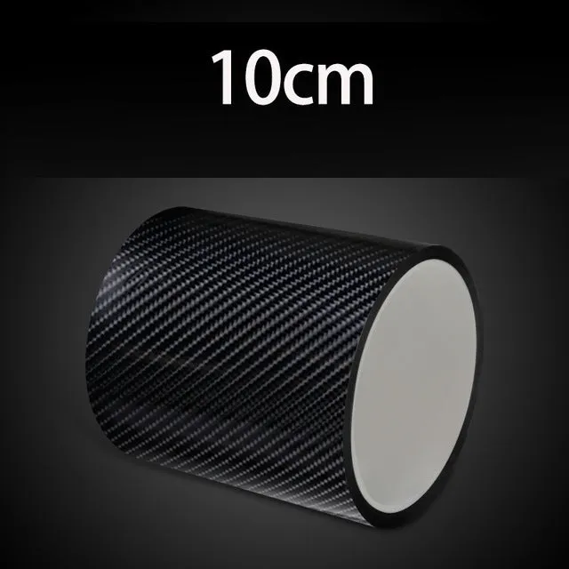 Black carbon fiber self-adhesive anti-collision decorative strip roll for car door threshold and bumper edge protection.