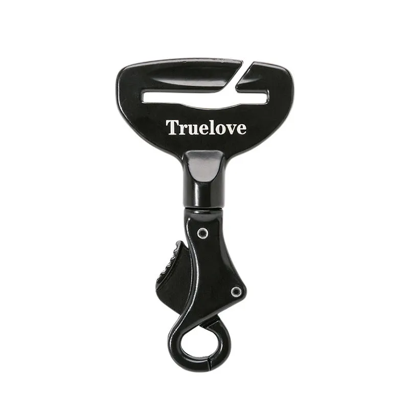 Black aluminium alloy dog car seat belt lock with 5cm tab resting on car seat