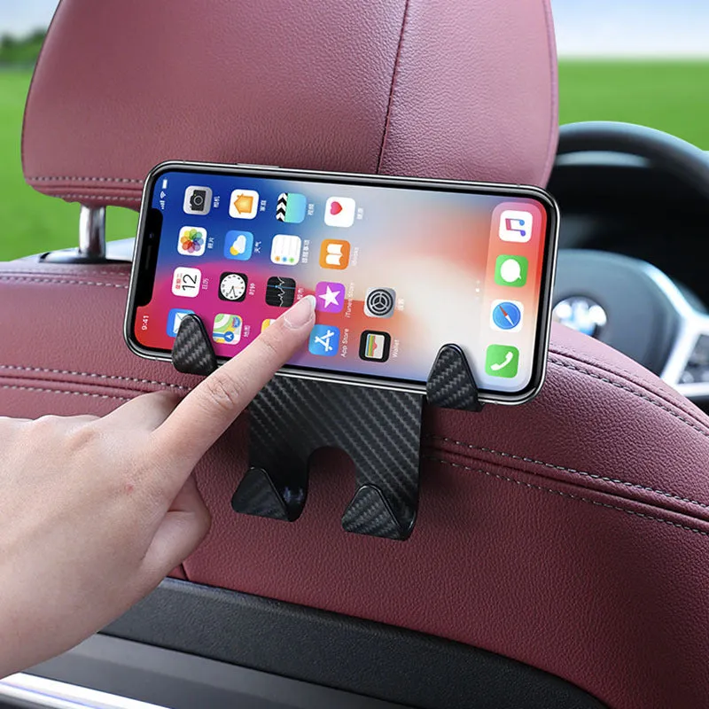 Black ABS plastic car hook and mobile phone holder bracket for rear seat back storage.