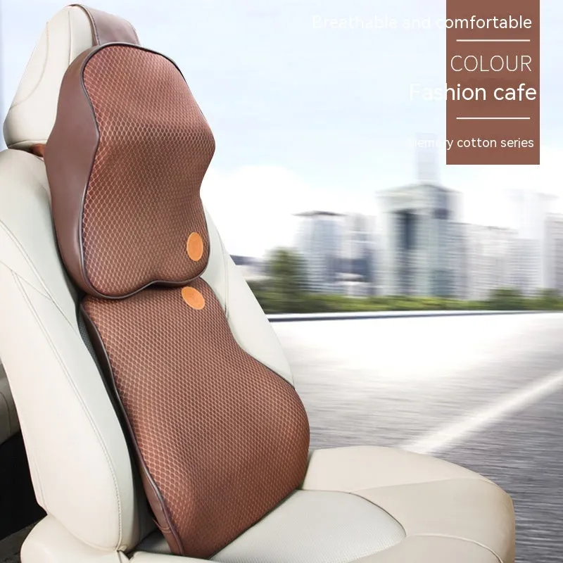 Black and beige memory foam car headrest pillow and lumbar support cushion set on a car seat.
