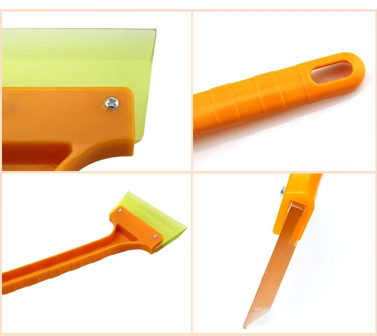 Yellow plastic car snow shovel for ice removal, 32cm length, on a dark background