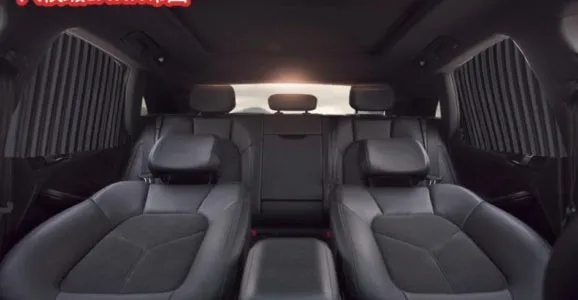 Magnetic car curtain sun shade in black attached to vehicle side window