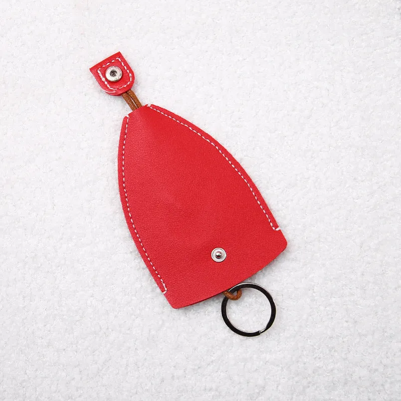 Cartoon pull-out key case in PU leather showing pull-out mechanism and colourful design options