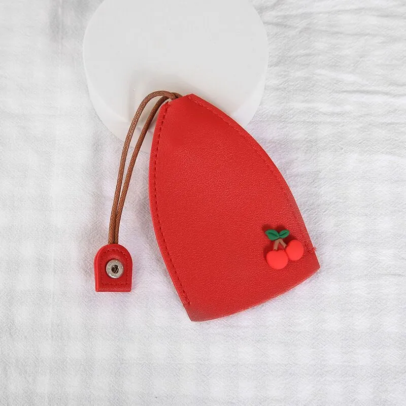 Cartoon pull-out key case in PU leather showing pull-out mechanism and colourful design options