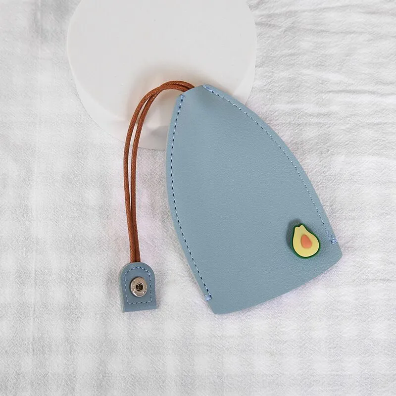 Cartoon pull-out key case in PU leather showing pull-out mechanism and colourful design options