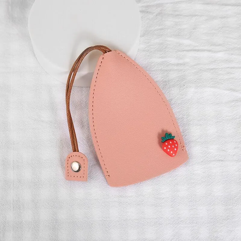 Cartoon pull-out key case in PU leather showing pull-out mechanism and colourful design options