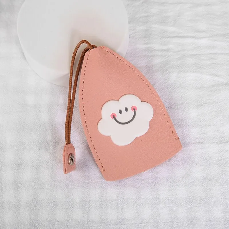 Cartoon pull-out key case in PU leather showing pull-out mechanism and colourful design options