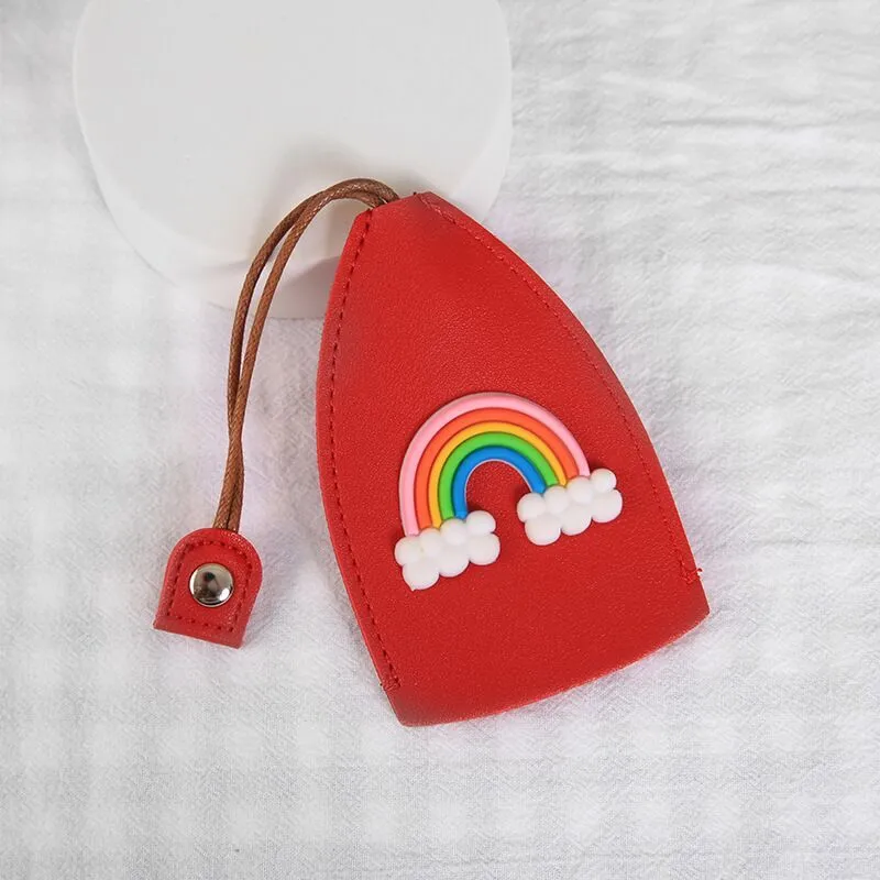 Cartoon pull-out key case in PU leather showing pull-out mechanism and colourful design options