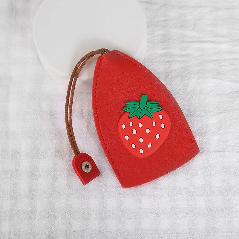 Cartoon pull-out key case in PU leather showing pull-out mechanism and colourful design options