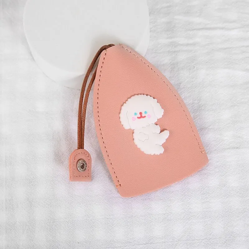 Cartoon pull-out key case in PU leather showing pull-out mechanism and colourful design options