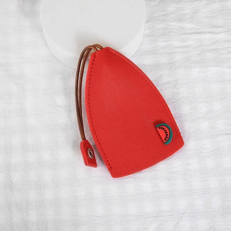 Cartoon pull-out key case in PU leather showing pull-out mechanism and colourful design options