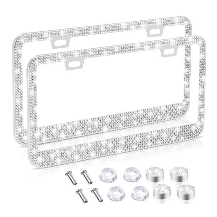 White diamond-studded stainless steel licence plate frame on a car showing 160x310mm external size