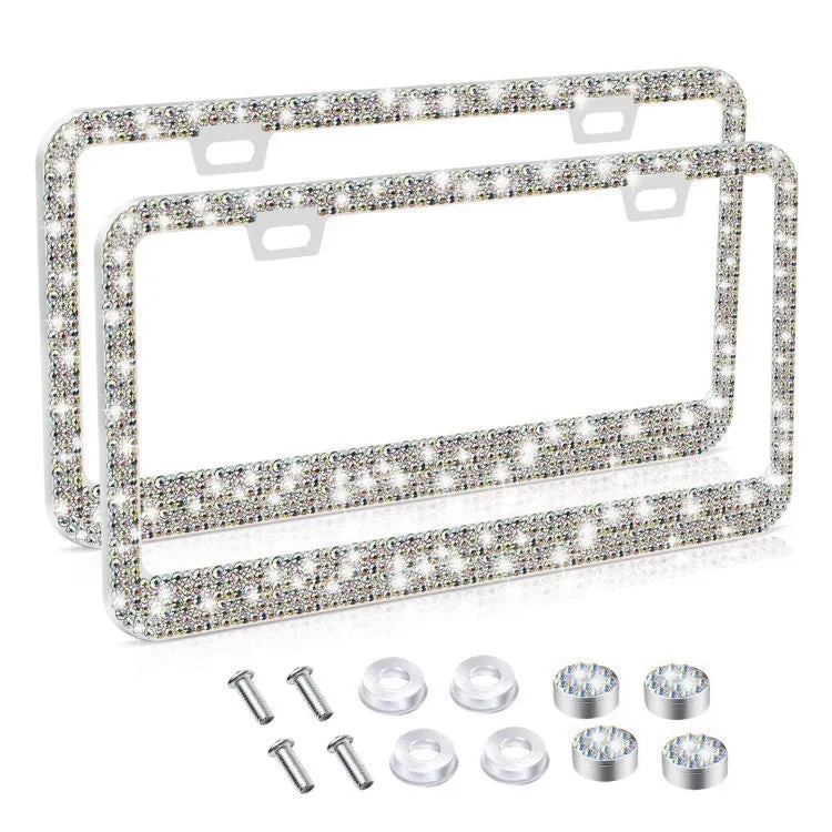 White diamond-studded stainless steel licence plate frame on a car showing 160x310mm external size