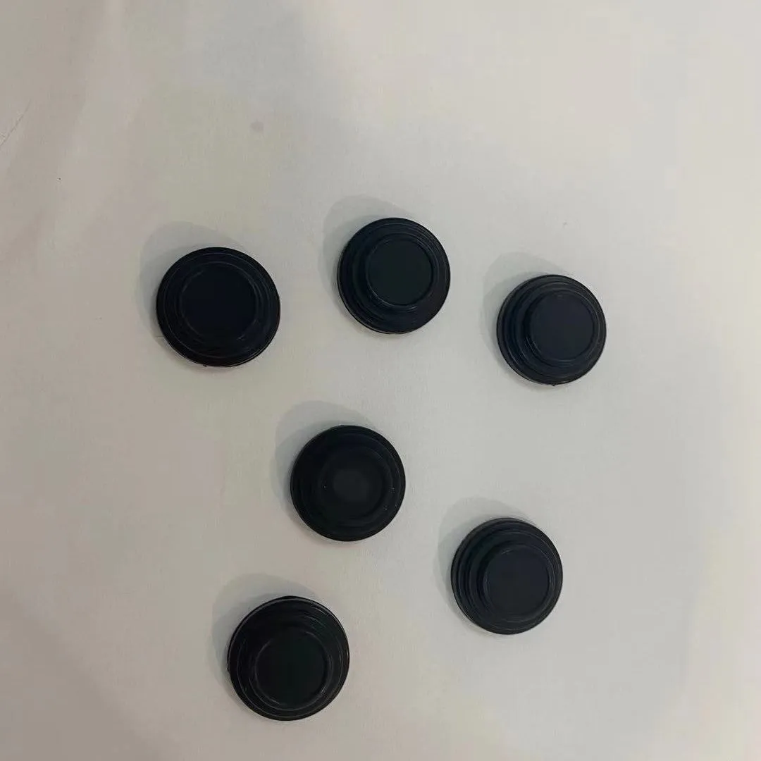 Black rubber car body sound insulation damping gasket with double-sided tape, approximately 2.8cm diameter