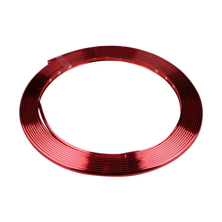 Galvanised purple PVC wheel hub trim protection strip on car alloy wheel