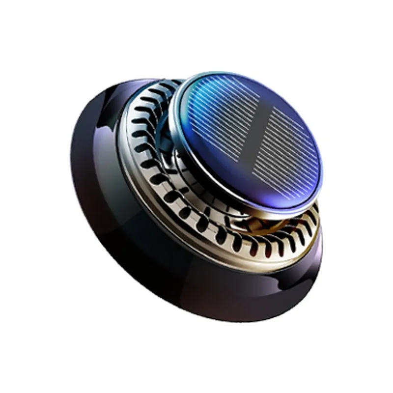 Black solar-powered car air freshener with rotating double rings on car dashboard