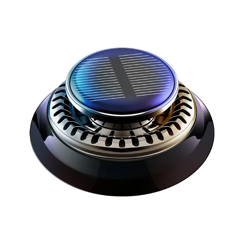 Black solar-powered car air freshener with rotating double rings on car dashboard